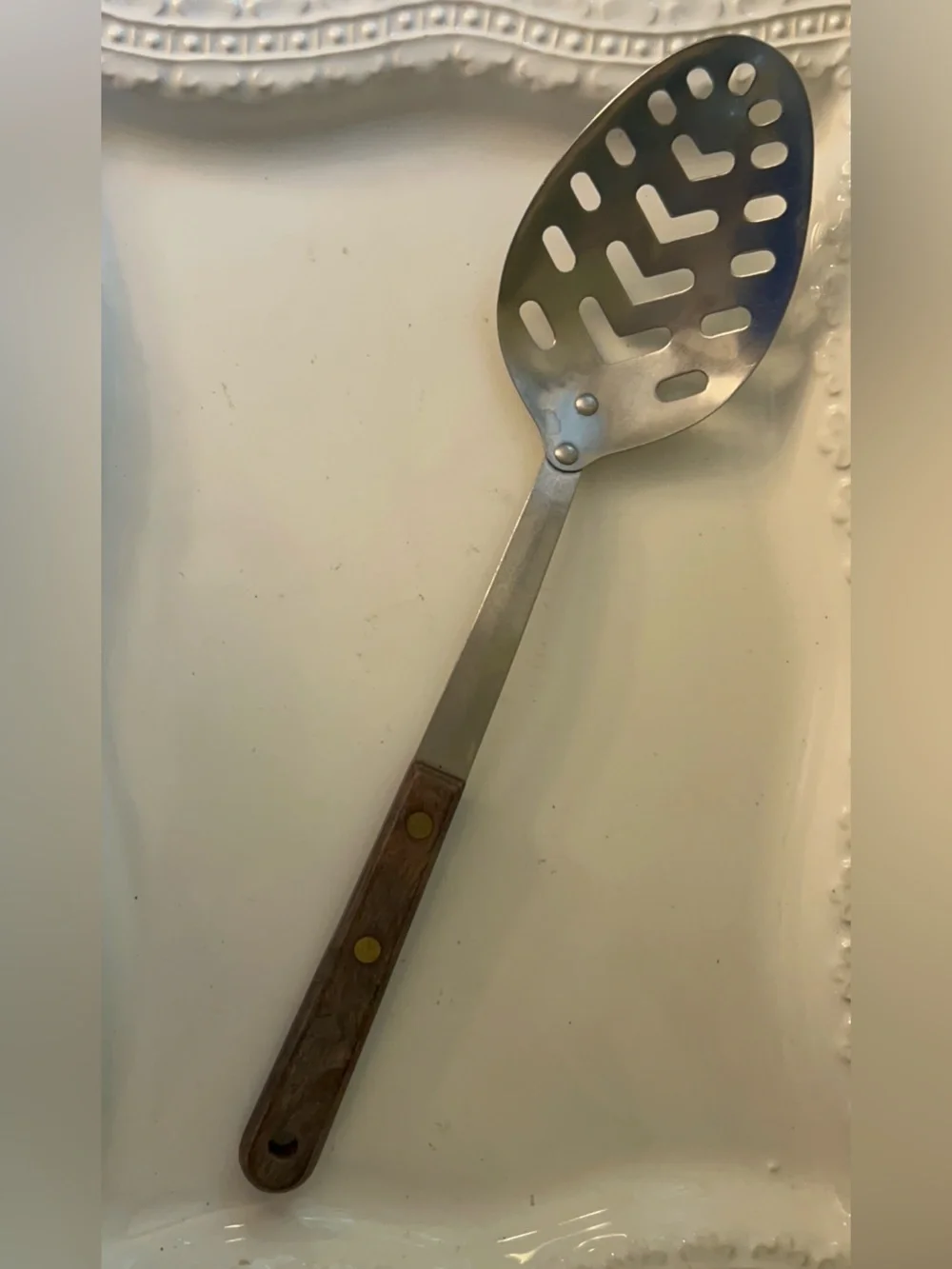 Vintage slotted Spoon with Wooden Handle